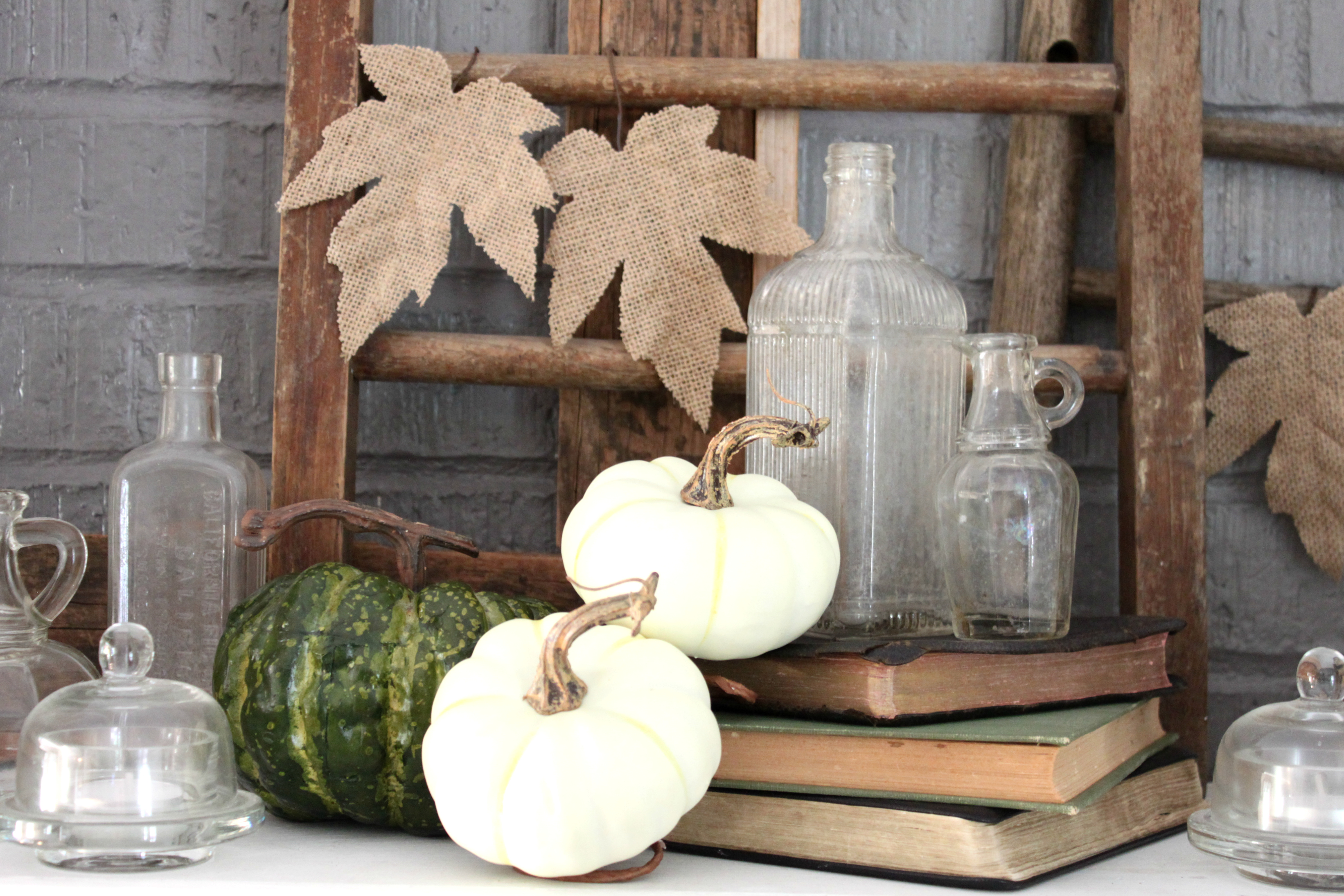fall-dining-room-books-medicine-bottles-pumpkins