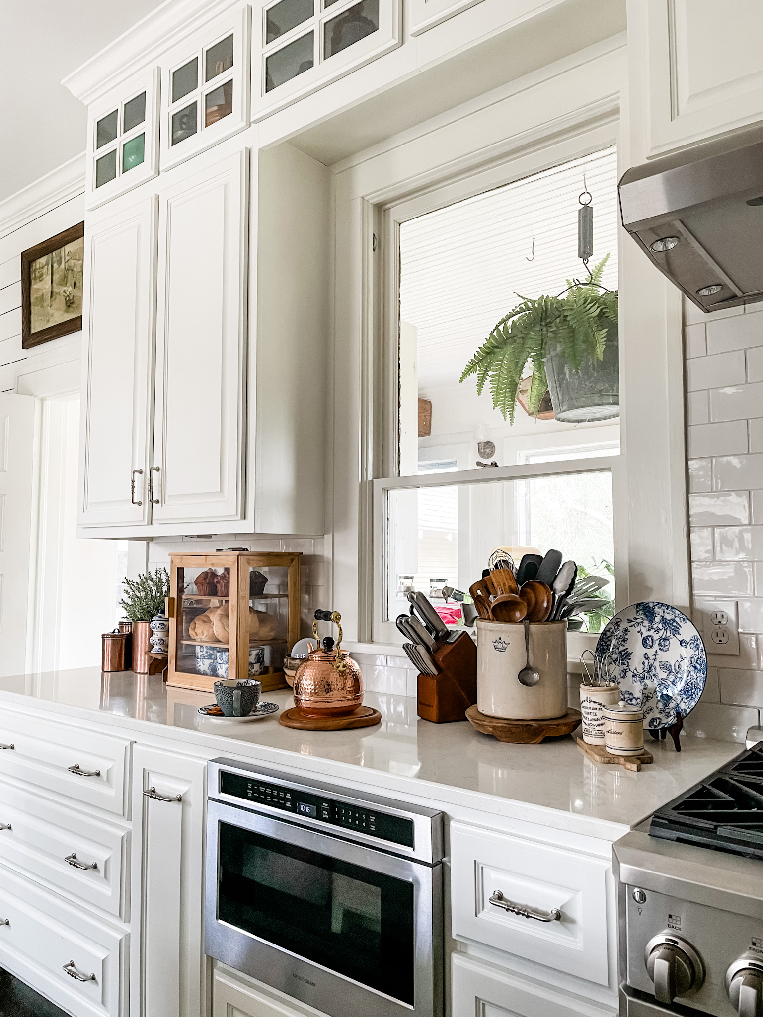 A cozy inviting white kitchen.